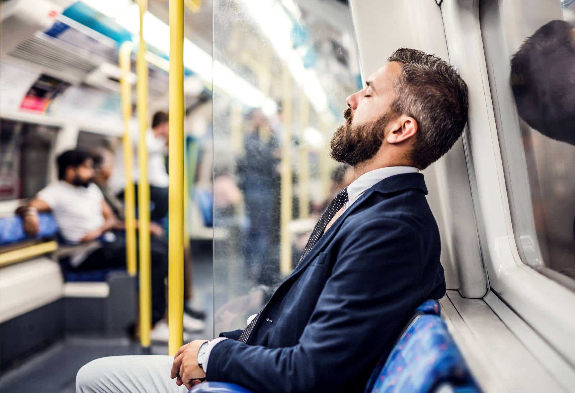 A man with IBD sleeping on the tube