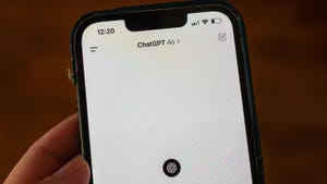 A black iPhone displaying the ChatGPT app using the brand new GPT-4o model