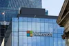 Photo of Microsoft sign on building Photo of Microsoft sign on building