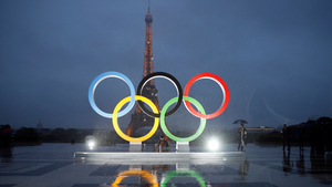 The unveiling of the Olympic rings on the esplanade of Trocadero in front of the Eiffel tower.