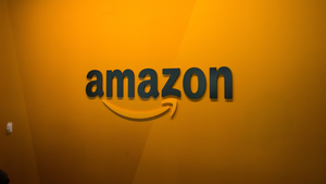 Amazon logo on orange wall