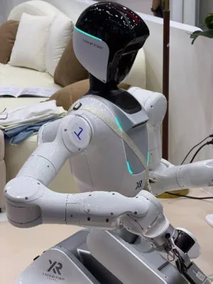 Photo of robot arm Photo of robot arm