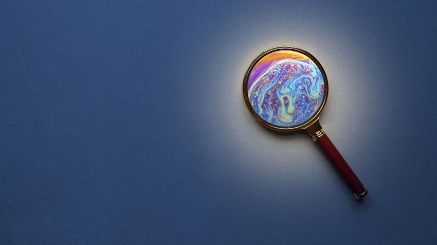 A magnifying glass with planet inside, representing creative AI