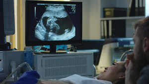 Woman having a fetal ultrasound in a doctor's office