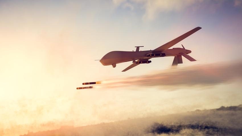 Autonomous drone in the sky firing two missiles