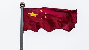 Chinese flag. China's National Supercomputer Center in Guangzhou has unveiled a new supercomputer for AI including large language model training