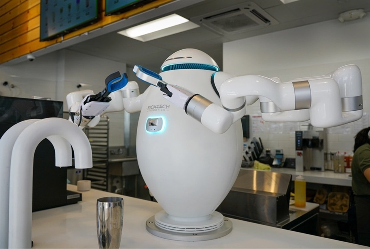 A Richtec Adam robot serves coffee A Richtec Adam robot serves coffee