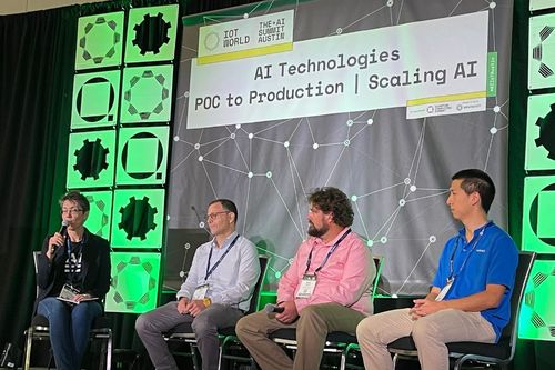 Panel on stage at the AI Summit Panel on stage at the AI Summit