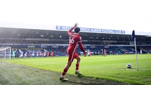 Trent Alexander-Arnold of Liverpool prepares to take a corner to set up the winning goal during the Premier League match between WBA and Liverpool