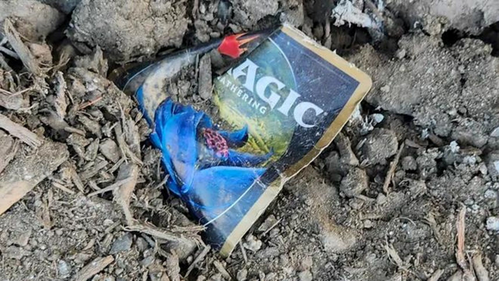 A Magic: The Gathering 30th anniversary card dumped in a landfill.