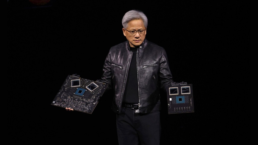 Nvidia founder and CEO Jensen Huang  holds up the new Blackwell Superchips