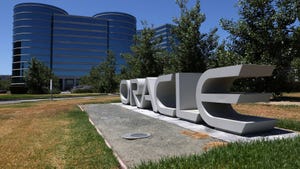 A sign is posted in front of Oracle headquarters