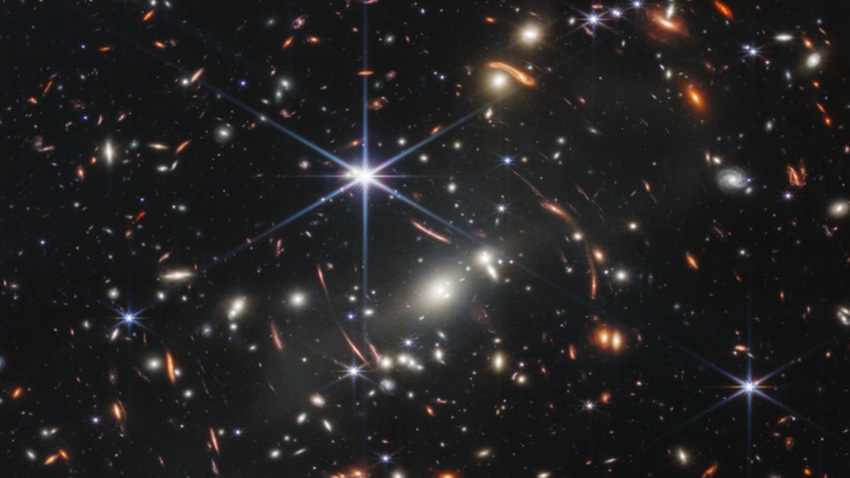 Thousands of small galaxies appear across this view. Webb's First Deep Field (NIRCam Image)