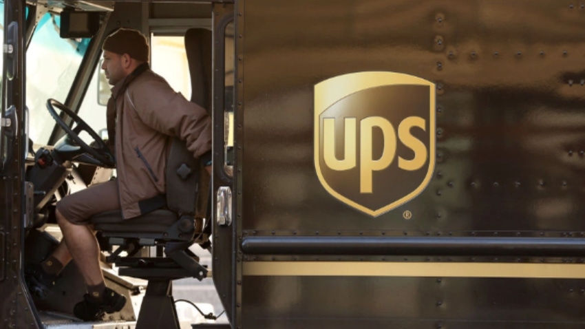 Photo of driver in a UPS truck