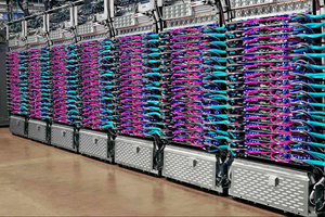 Photo of servers neatly lined up with cables connecting them 