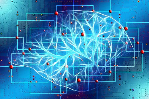 Stylised image of a brain made up of blue boxes and red dots Stylised image of a brain made up of blue boxes and red dots