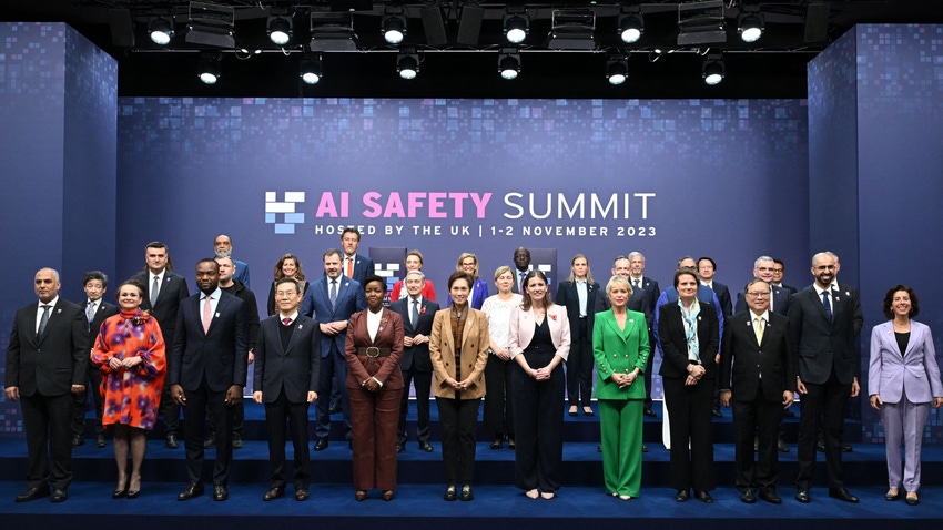 Britain's Science, Innovation and Technology Secretary Michelle Donelan with attendees at the AI Safety Summit at Bletchley Park