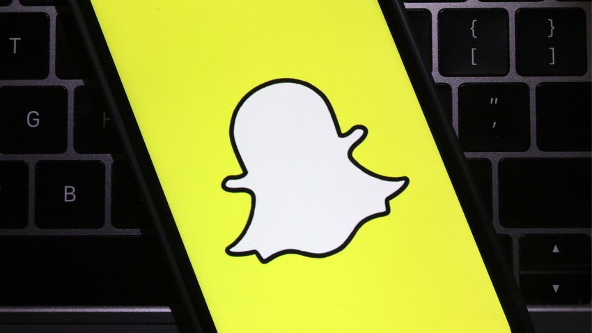 In this photo illustration, the Snapchat logo is displayed on a cell phone screen