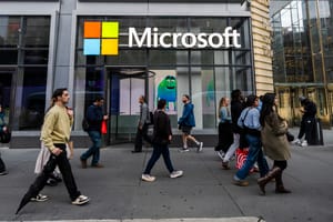 Photo of Microsoft sign on building Photo of Microsoft sign on building