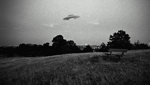 Composite image of a spaceship flying above a field