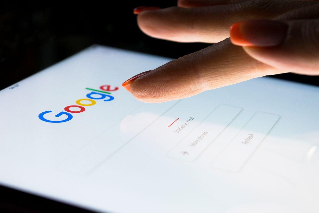 Someone using Google's search engine on a tablet Someone using Google's search engine on a tablet