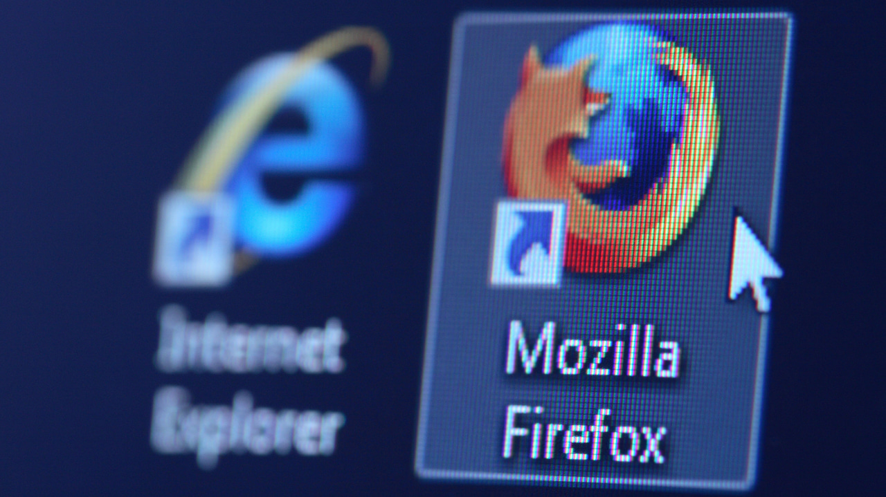 A close-up of the Firefox application next to the Internet Explorer application A close-up of the Firefox application next to the Internet Explorer application