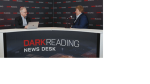 Two people talking at a news desk against a dark backdrop with "Dark Reading" written on it. Two people talking at a news desk against a dark backdrop with "Dark Reading" written on it.
