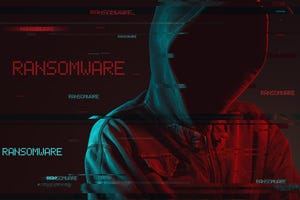 A person in a black hoodie with face hidden against a dark background and the words ransomware in red and green.