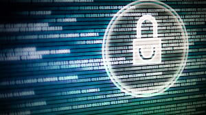 White light padlock icon over an led computer screen monitor display of binary 1s and 0s White light padlock icon over an led computer screen monitor display of binary 1s and 0s