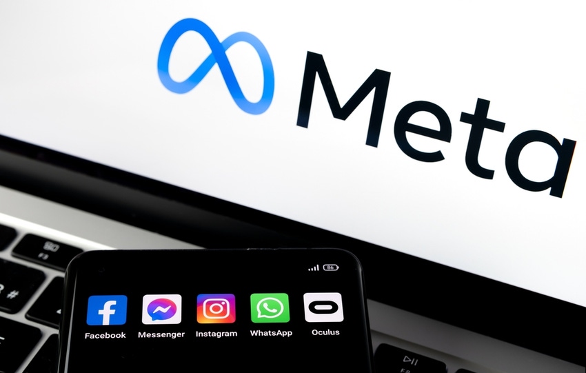 meta logo on desktop screen and phone with logos of messenger, facebook, instagram, oculus and whatsapp