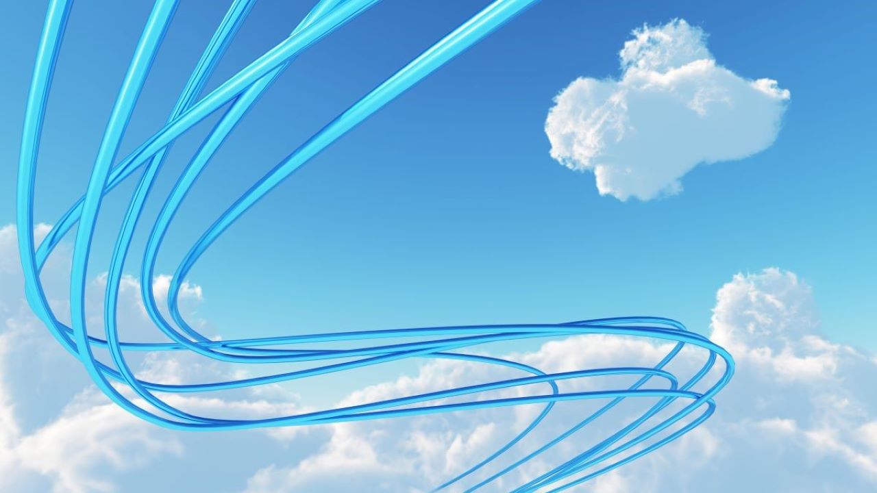 Blue streamers in the sky against clouds Blue streamers in the sky against clouds