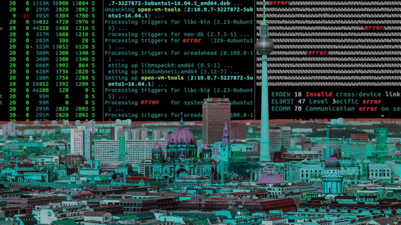 A cityscape on the bottom with lines of code on top A cityscape on the bottom with lines of code on top