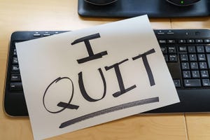 Sign on keyboard saying "I quit"