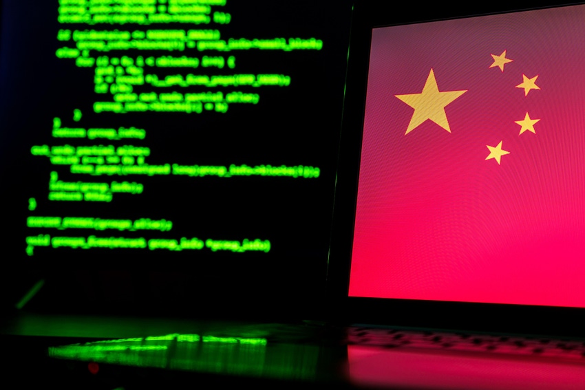 Computer code on left; Chinese flag on right
