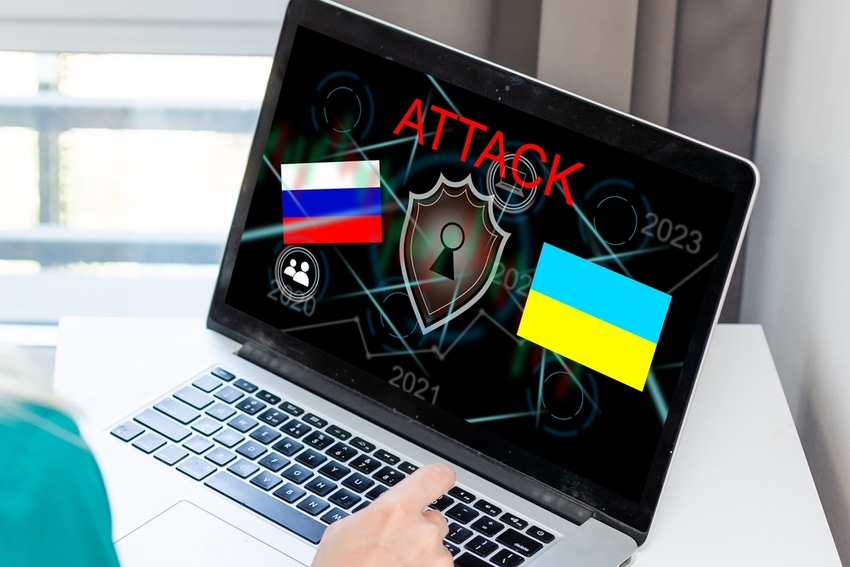 Russian and Ukraine flags on a laptop display