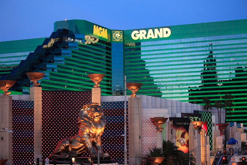The MGM Grand casino in Las Vegas at twilight, with the sky still bright but the lights coming on