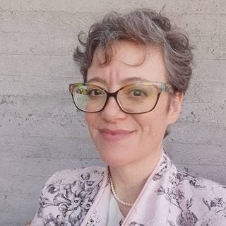 Karen Spiegelman, Features Editor
