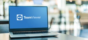 Laptop computer displaying logo of TeamViewer remote access software