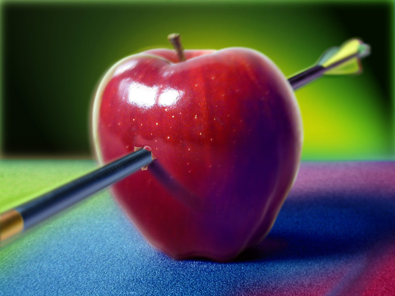 Photo of red apple hit by an arrow Photo of red apple hit by an arrow