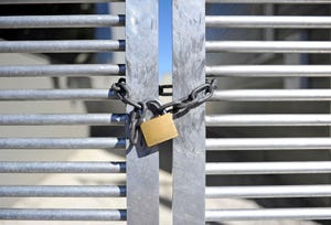 Gate with a padlock