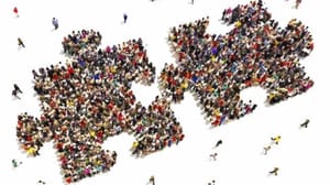 Puzzle pieces made up of people trying to get pieces together. Puzzle pieces made up of people trying to get pieces together.