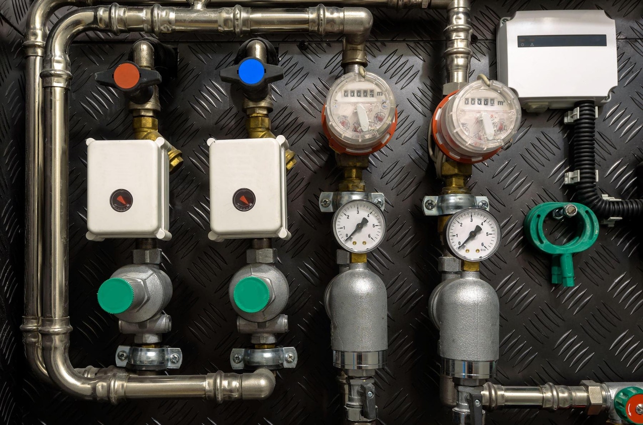Water pipes, valves, and manometers inside a home Water pipes, valves, and manometers inside a home