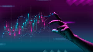 A hand reaching out to touch holographic stock market figures in purple and blue