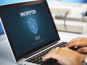 The word "encryption" on a laptop screen