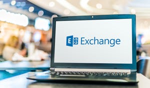 laptop open with microsoft exchange logo displayed on screen