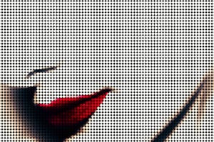 Pop art dots effect close up portrait of a woman’s nose, red lipstick and jawline