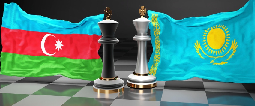 The flags of Azerbaijan and Kazakhstan on a chess board next to the king pieces