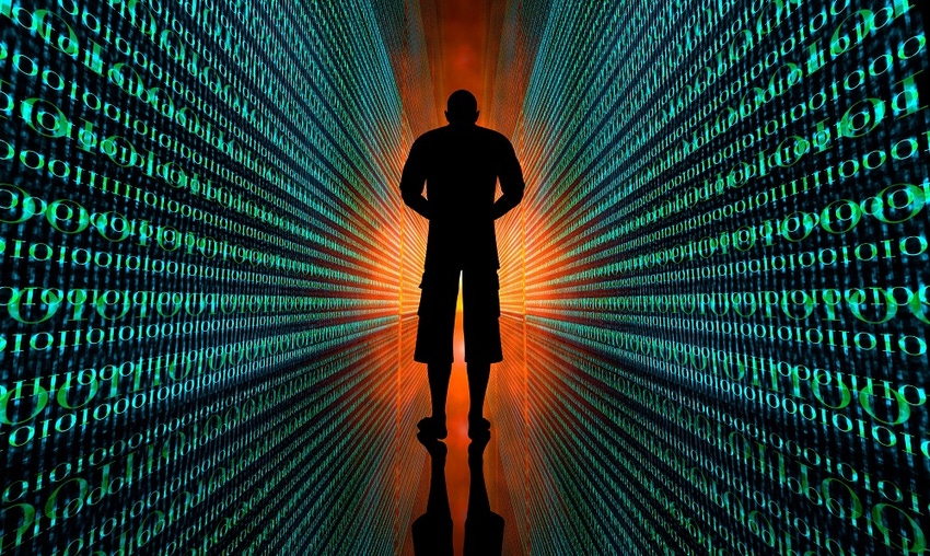 Back of man standing in a digital background