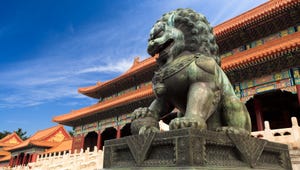 Lion statue in front of the Forbidden City in China