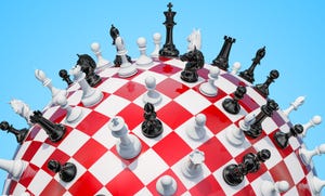 Chess pieces on a globe-shaped board